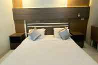 Bedroom Puri Oasis Hotel Pangkalpinang