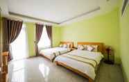 Kamar Tidur 2 Trung Nhan Hotel