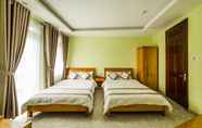 Kamar Tidur 4 Trung Nhan Hotel