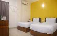 Phòng ngủ 4 Brezza Hotel Sitiawan