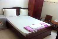 ห้องนอน Minh Chau Hotel