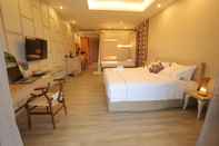ห้องนอน Navela Hotel & Banquet