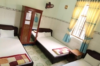 Phòng ngủ Vu Hoang Guest House