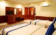 Kamar Tidur 6 Tran Long Hotel Binh Duong