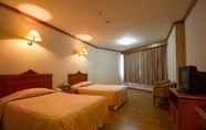 Kamar Tidur 6 Rim Pao Hotel