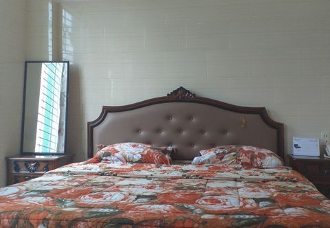 Kamar Tidur OYO 692 Hotel Graha Buana