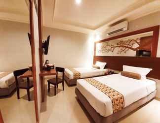 Phòng ngủ 2 Careinn Hotel Merauke