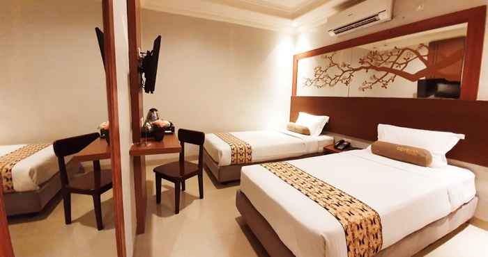 Bedroom Careinn Hotel Merauke