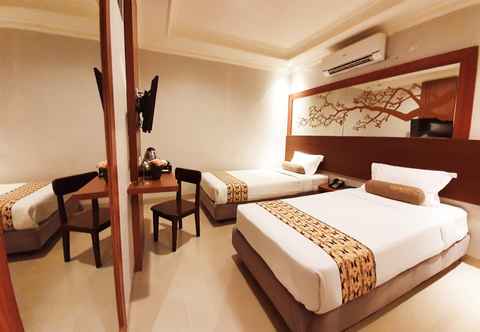 Bedroom Careinn Hotel Merauke