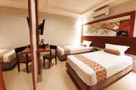 Bedroom Careinn Hotel Merauke