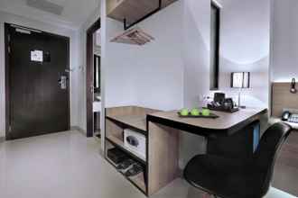 Kamar Tidur 4 Hotel Neo Gajah Mada Pontianak by ASTON  