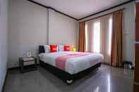 Bedroom Capital O 2102 Grand Mutiara Hotel