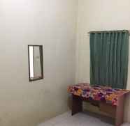 Kamar Tidur 4 Single Room at Rumah Agita Palembang (AGT)