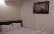 Kamar Tidur 5 Lam Anh Hotel