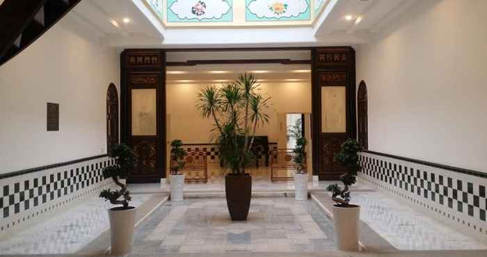 Lobi Heeren Palm Suites