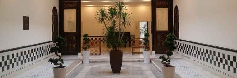Lobby Heeren Palm Suites