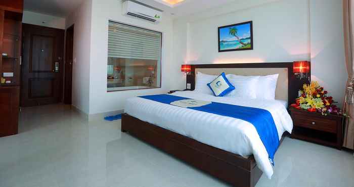 Kamar Tidur Blue Wave Hotel