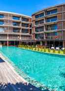 SWIMMING_POOL Suites by Watermark Hotel and Spa