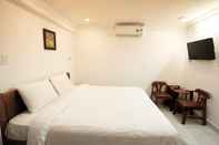 Kamar Tidur Leo Leo Coffee Homestay