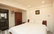 Kamar Tidur 2 Leo Leo Coffee Homestay