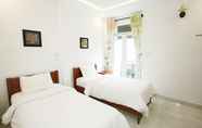 Kamar Tidur 4 Leo Leo Coffee Homestay