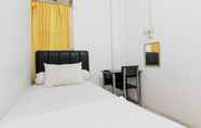 Kamar Tidur 4 Lestari Guesthouse