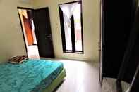 Kamar Tidur Rumah Majapahit B13