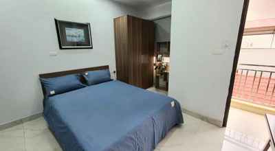 Phòng ngủ 4 Homey Apartment 2