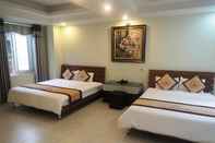 Kamar Tidur Calvin Hotel