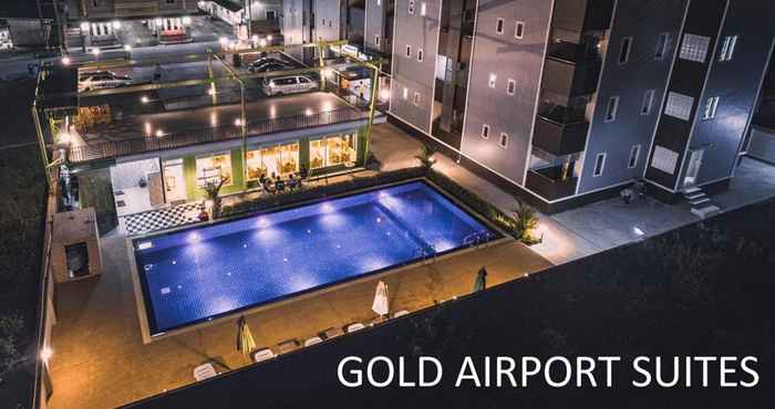 Exterior Gold Airport Suites