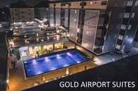 Exterior Gold Airport Suites