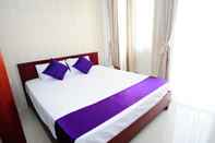 Kamar Tidur Cozy Condos Serviced Apartments