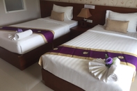 Kamar Tidur Tipparika Riverview Hotel