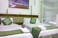 Kamar Tidur Sky Dragon Hotel