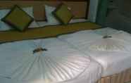 Kamar Tidur 2 Sky Dragon Hotel