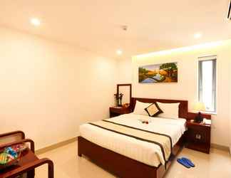 Kamar Tidur 2 OTIS Hotel