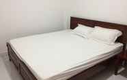 Kamar Tidur 6 Huong Son Guesthouse