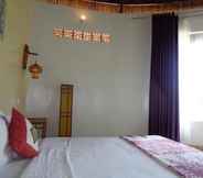 Bedroom 5 Ninila Fruit Farm Bungalows