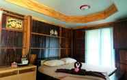 Phòng ngủ 3 Ruenpinwilai Resort