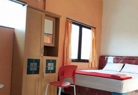 Bedroom Cozy Room at Guesthouse Menur