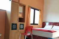 Kamar Tidur Cozy Room at Guesthouse Menur