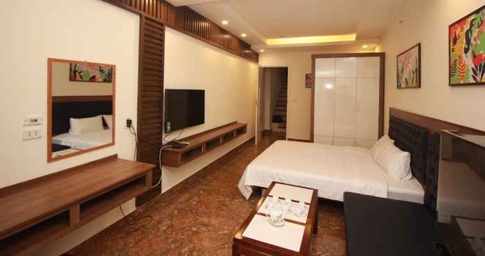 Kamar Tidur Happy Hotel Hanoi