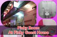 Kamar Tidur Pinky Guest House Syariah Kota Batu