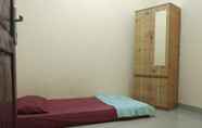 Bedroom 4 Budget Room near Universitas Batam