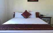 Kamar Tidur 2 Rosa Bay Side Guesthouse