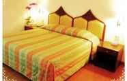 Bilik Tidur 6 Tangerine Ville Hotel