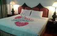 Kamar Tidur 4 Tangerine Ville Hotel