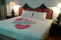 Kamar Tidur Tangerine Ville Hotel