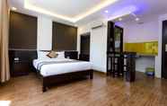 Bilik Tidur 4 Manchester Hotel & Apartment