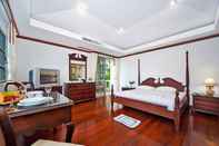 Bedroom Ruedi Villa - 2 Plus 1 Bed Holiday Home with Pool at Kata Beach Phuket